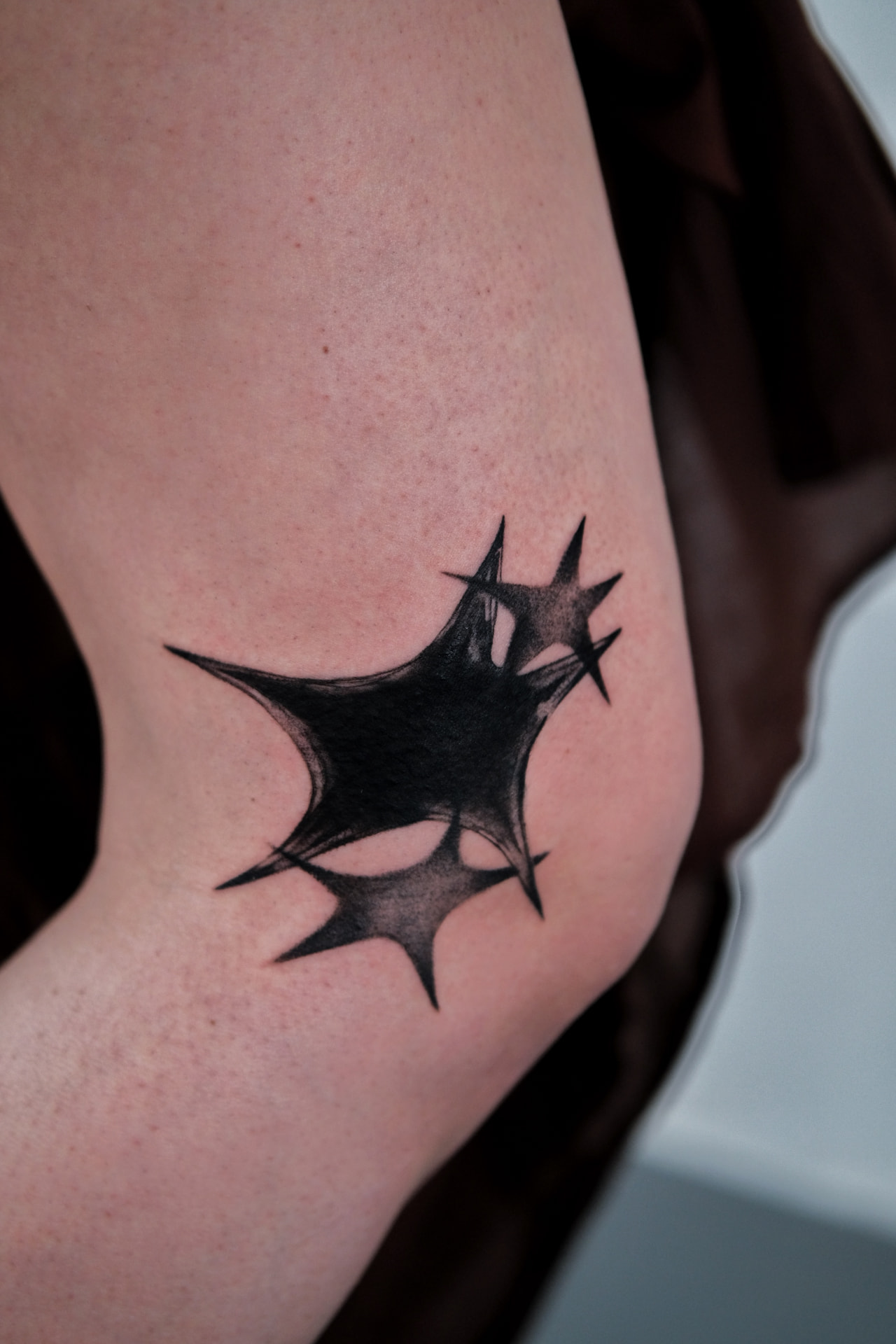 Abstract blackwork tattoo after cover-up